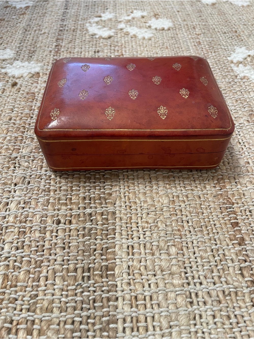 vintage Italian burgundy leather box featuring embossed gold fleur-de-lis